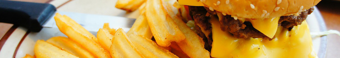 Eating Burger at Storm Castle Café restaurant in Bozeman, MT.